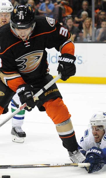 Canucks spoil Ducks' home opener with 2-1 shootout win